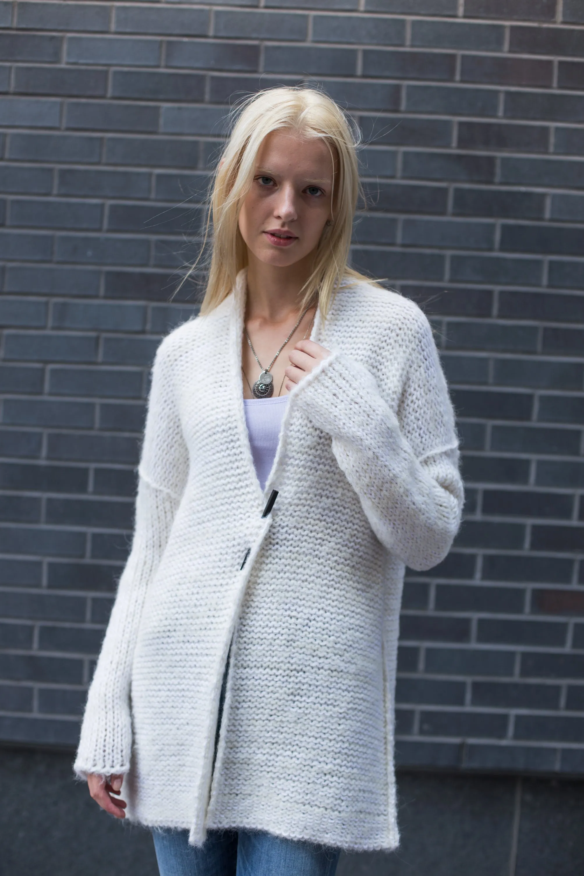 White alpaca knit cardigan.