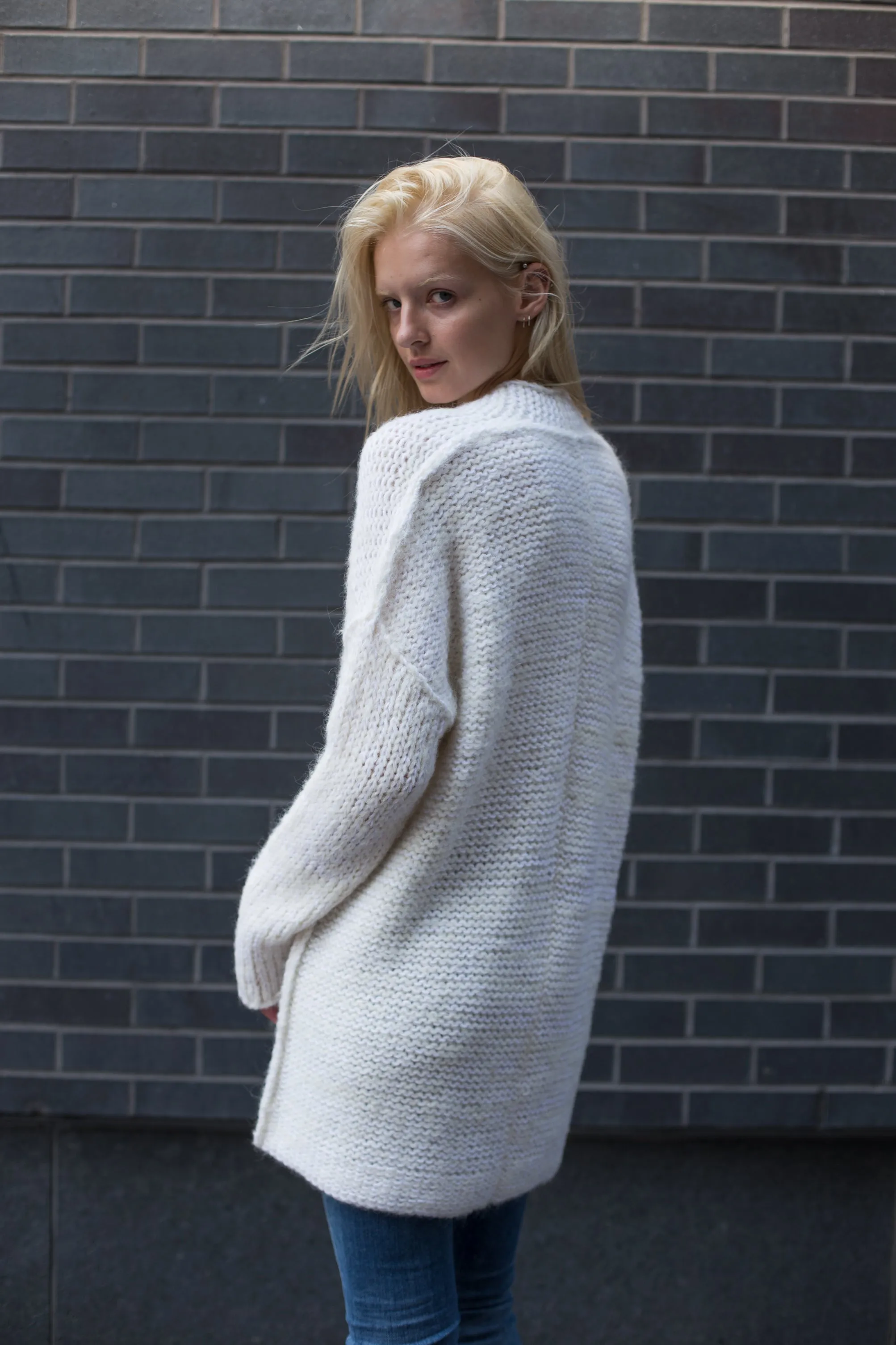 White alpaca knit cardigan.